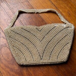 Elegant Pearl-Embellished Ivory Clutch